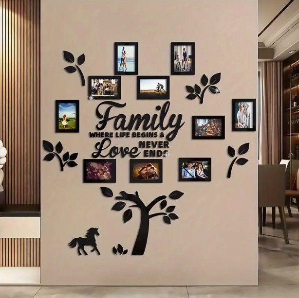 Family picture wall with black frames, cursive text, and decorative tree silhouettes on beige wall.