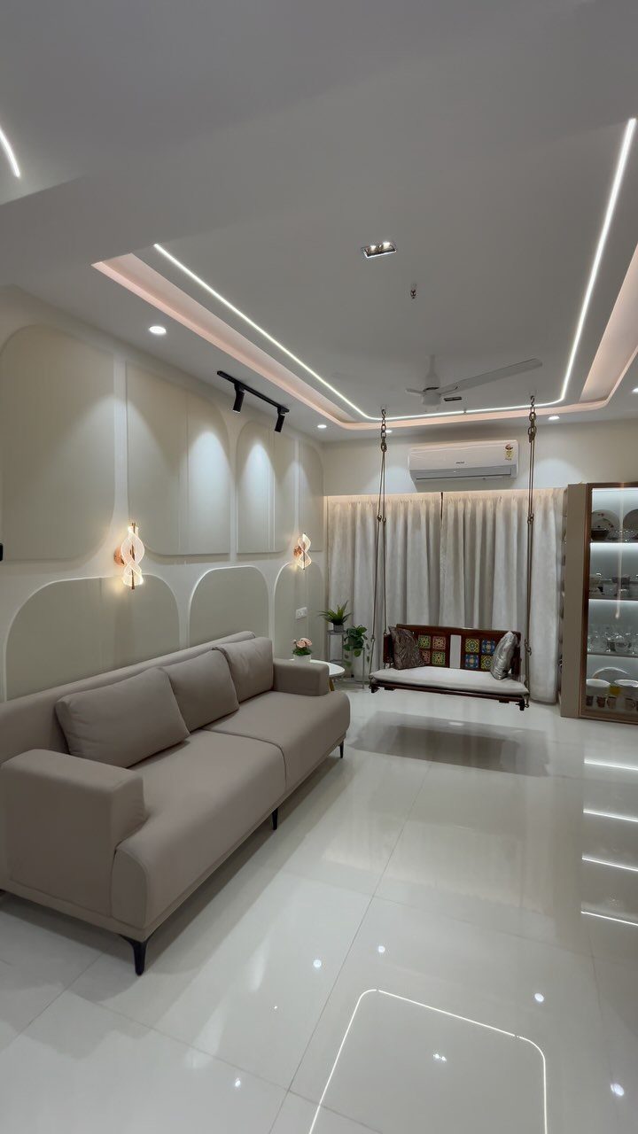 Beige sofa and wooden indoor swing in a modern, brightly lit living room