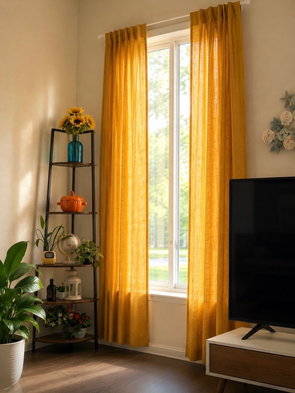 Yellow linen curtains framing a window next to a black metal shelving unit.