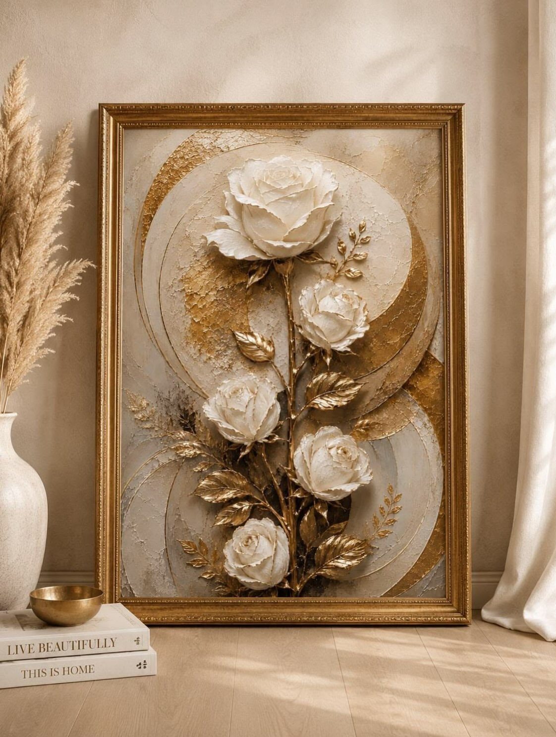 Gold-framed 3D textured painting of white roses leaning against a neutral wall.