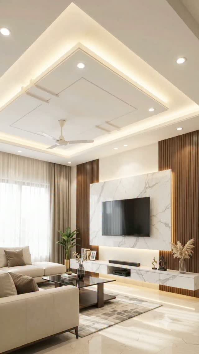 Modern living room with a white multi-level drop ceiling and integrated cove lighting.