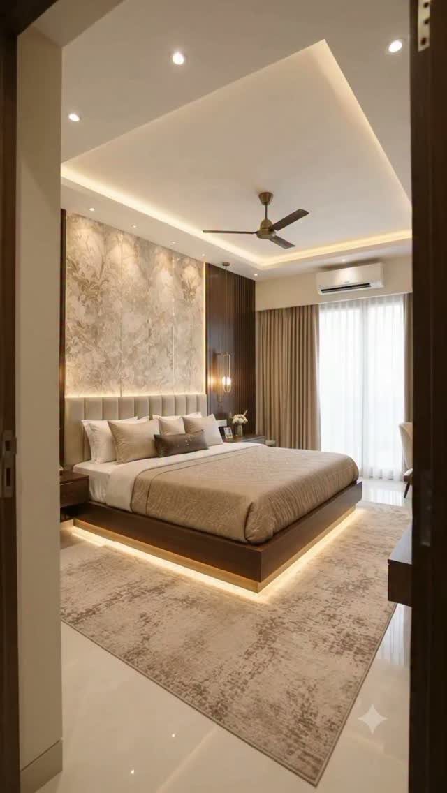 Modern bedroom with a textured beige accent wall and a platform bed.
