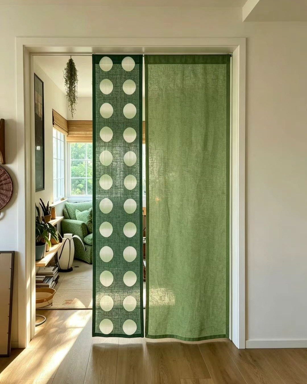Green sliding door curtains, one solid and one with white polka dots.