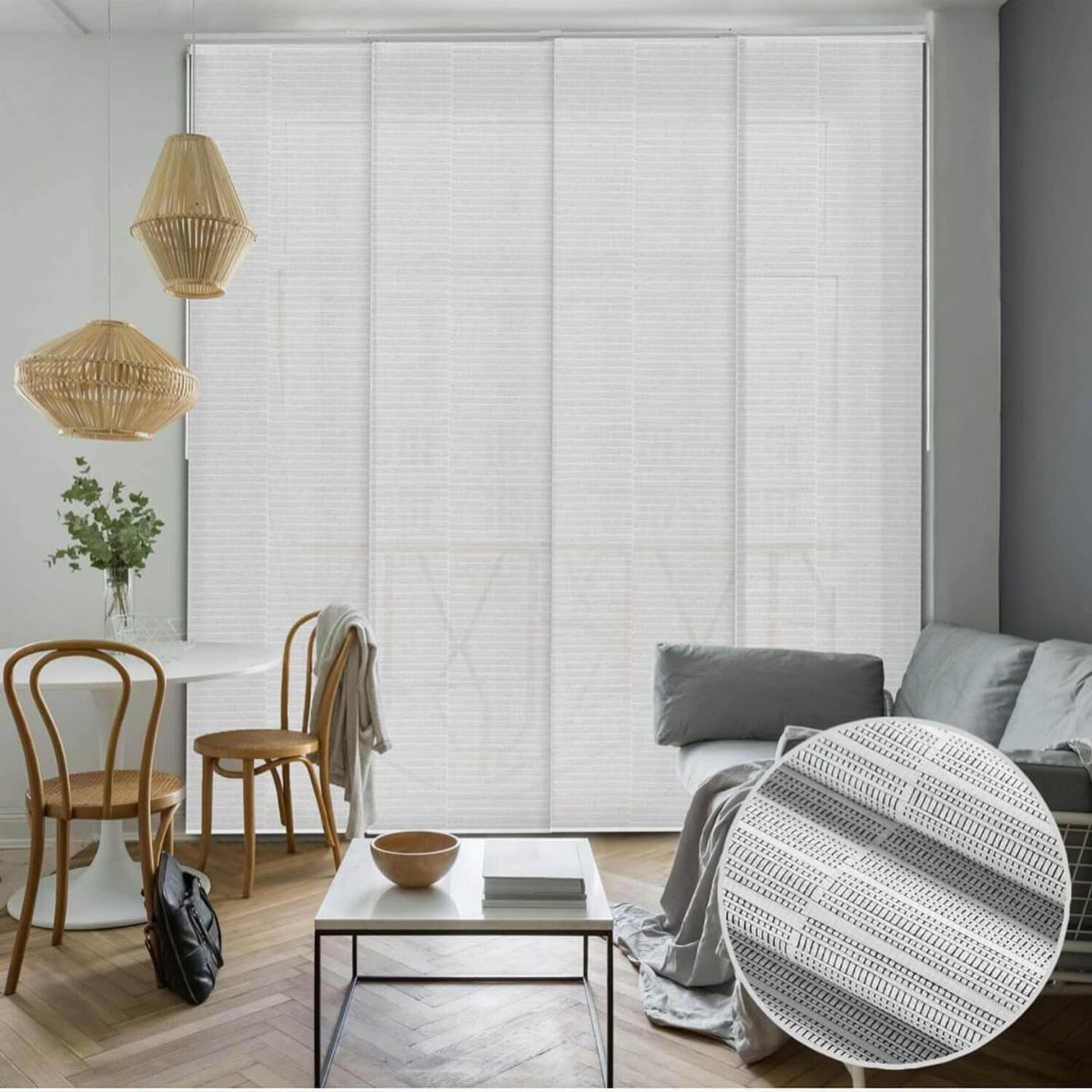 White panel track blinds on a sliding door in a modern bright living room.